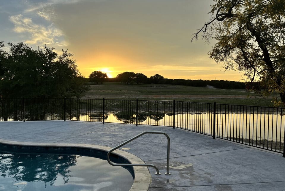Community pool at sunset