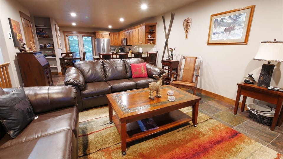 Living Room with comfortable seating for 6 arge TV and comfy couches