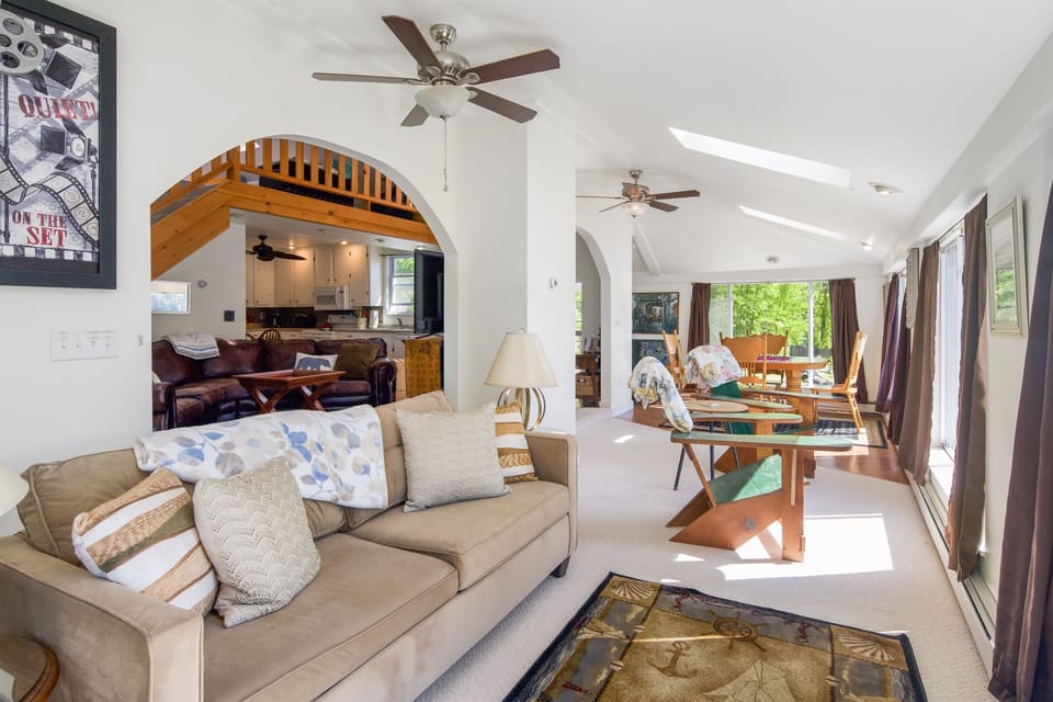 House living room , with cozy couch and armchairs