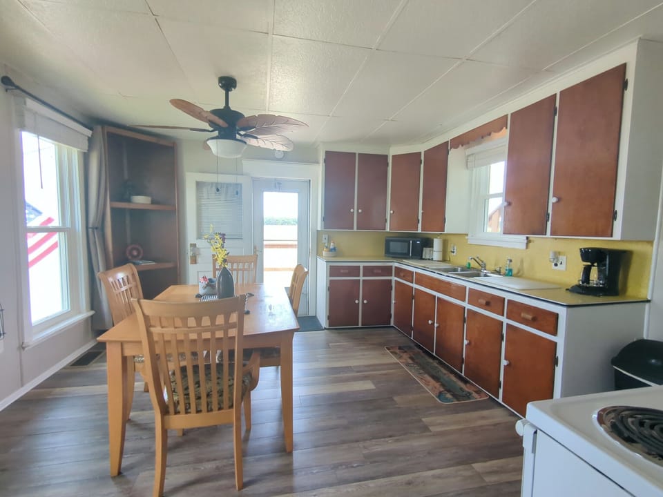 Dining table right in the kitchen to sit and enjoy a quick meal or drink your morning coffee.