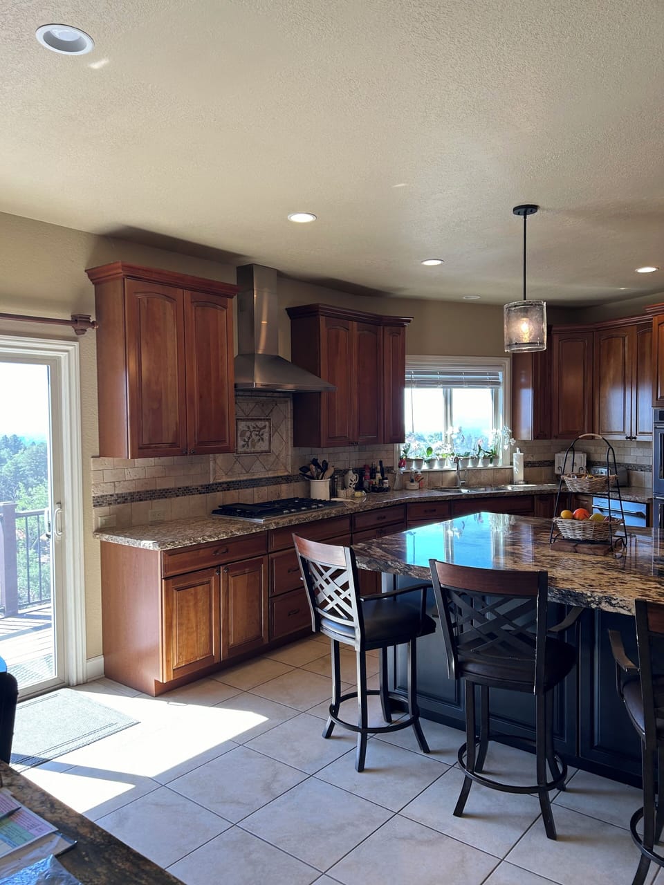 Large gourmet kitchen with balcony and barbeque access