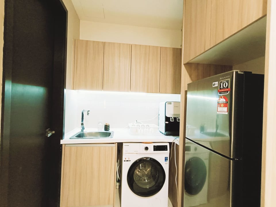 Kitchen with Refrigerator, Washer & Dryer, Water Dispenser