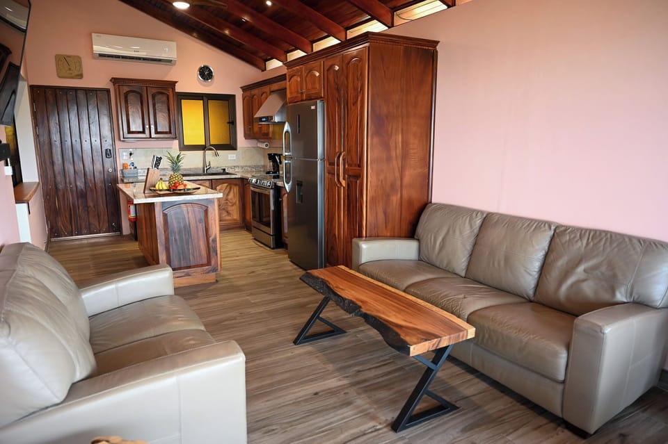 Custom made local Cenizaro coffee table in living room. 
