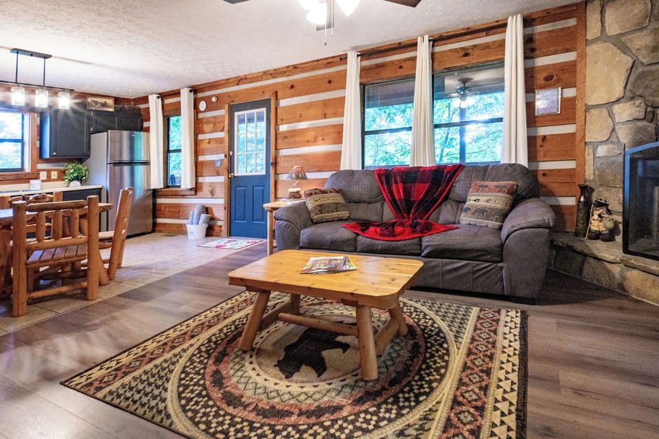 Rustic wood accents and an inviting seating area, perfect for gatherings!