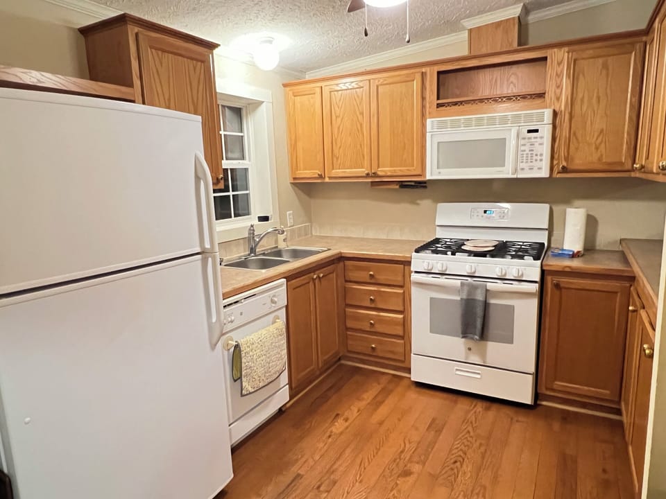 Kitchen--fully stocked with plates, pots, pans, etc.