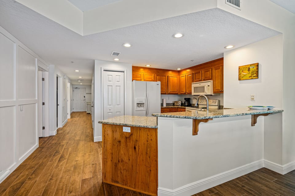 Kitchen and Looking down the Main Hallway