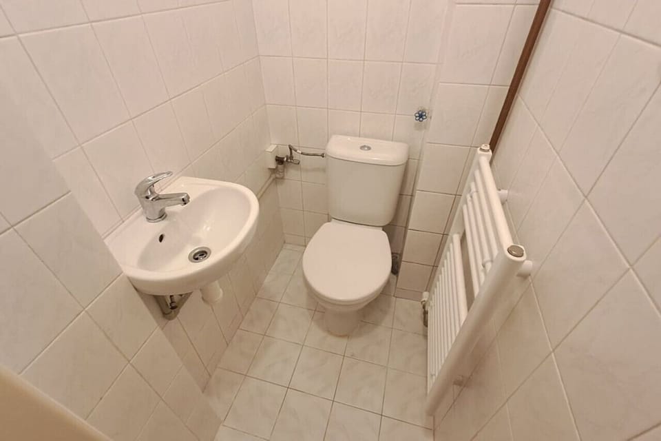 bathroom with towel rack