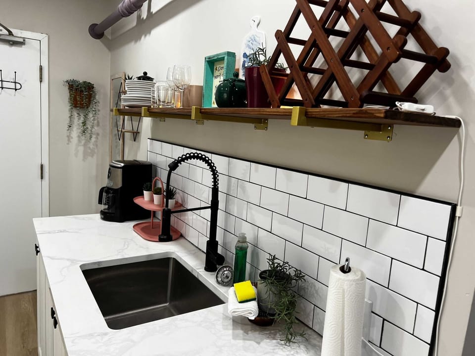 Cook, eat, connect – a fully equipped kitchen opens into a cozy dining space.