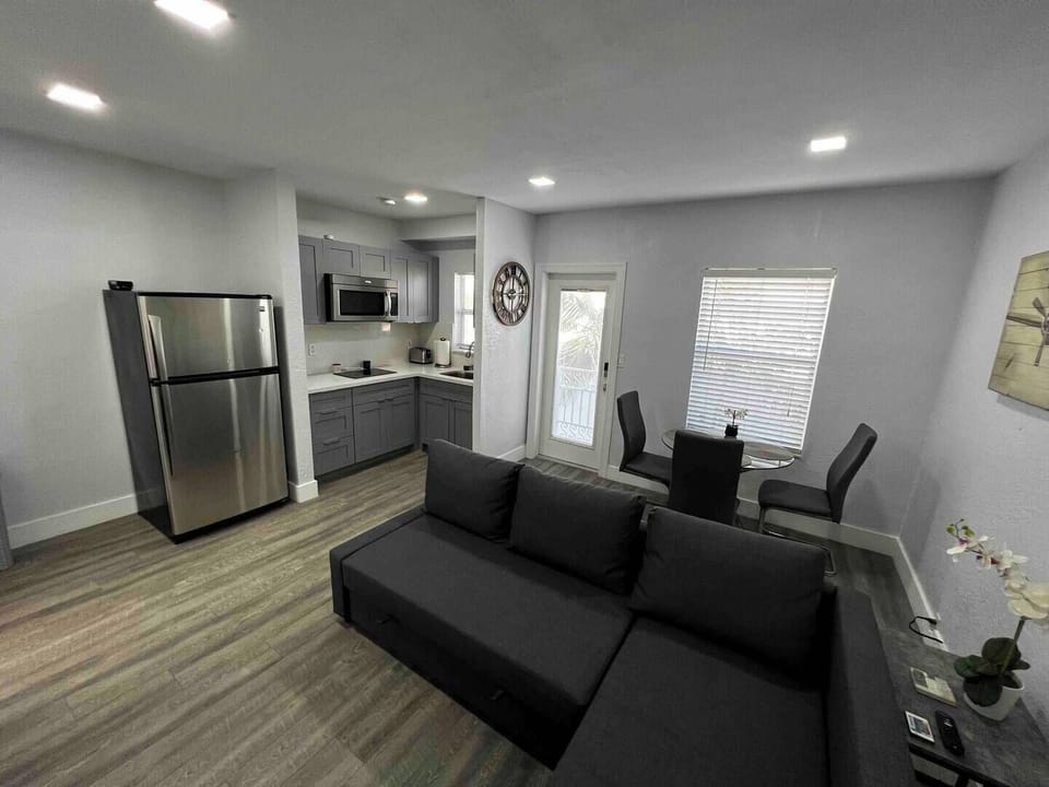 living room with view of dining area or workspace. 