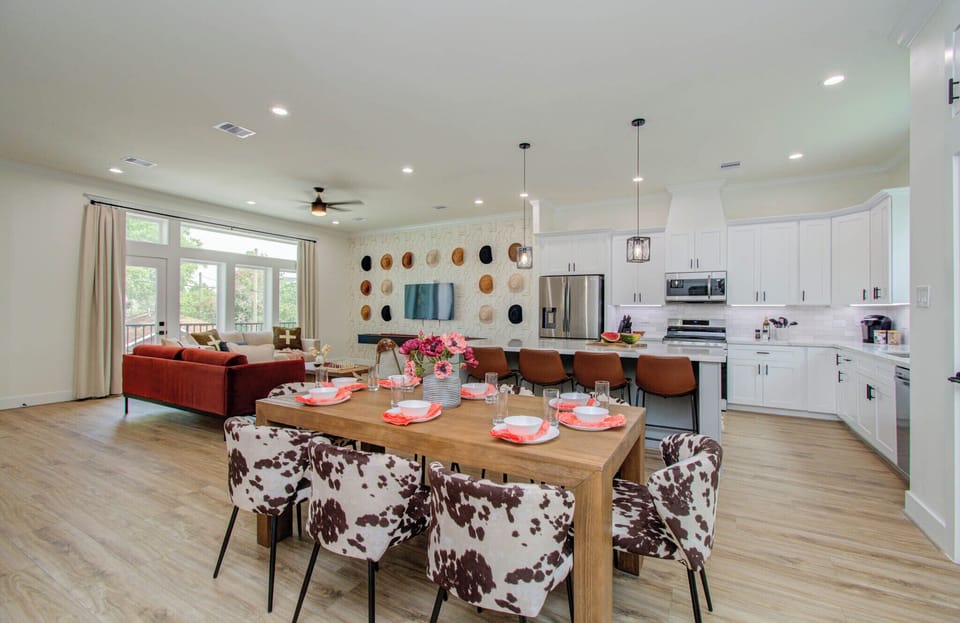 Dining area for 8 in an open floor plan concept with the kitchen and living room