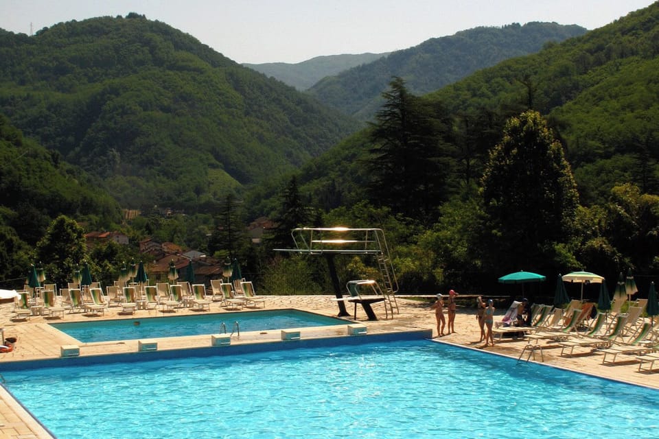 The outdoor pool is 5 mins walk from the apartment in an incredible setting
