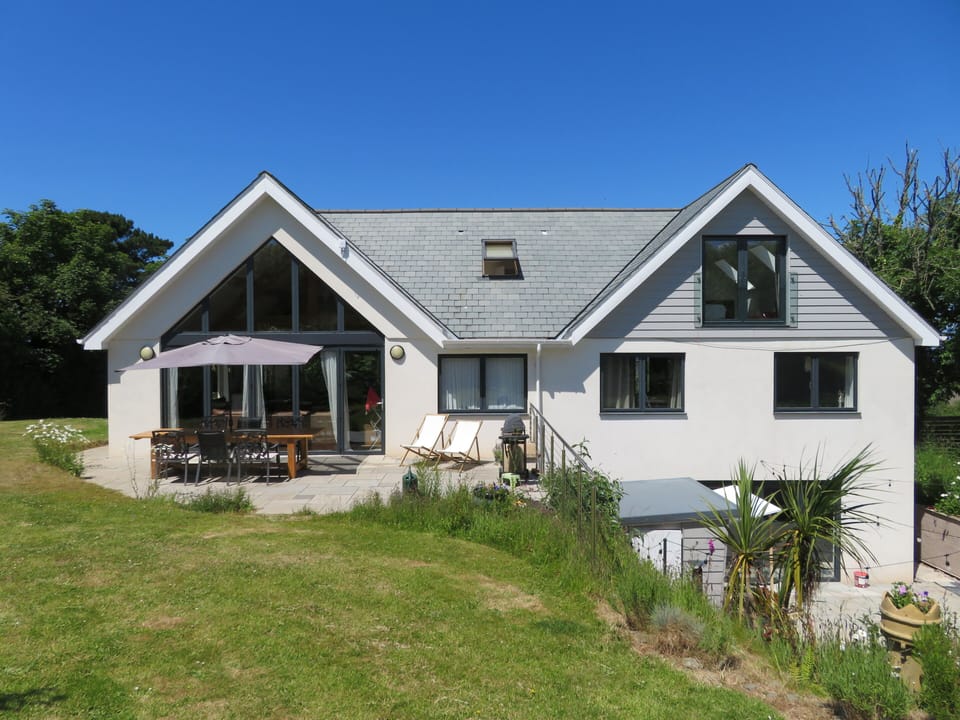 Rear view of house showing sun terrace and sunken garden