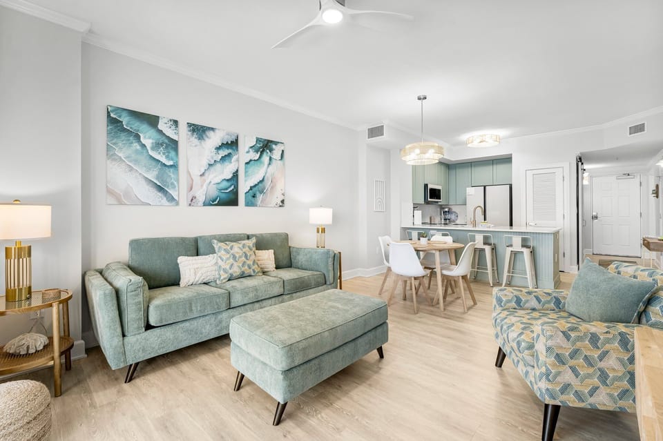 Spacious living room with Gulf views, premium sleeper sofa and large smart TV