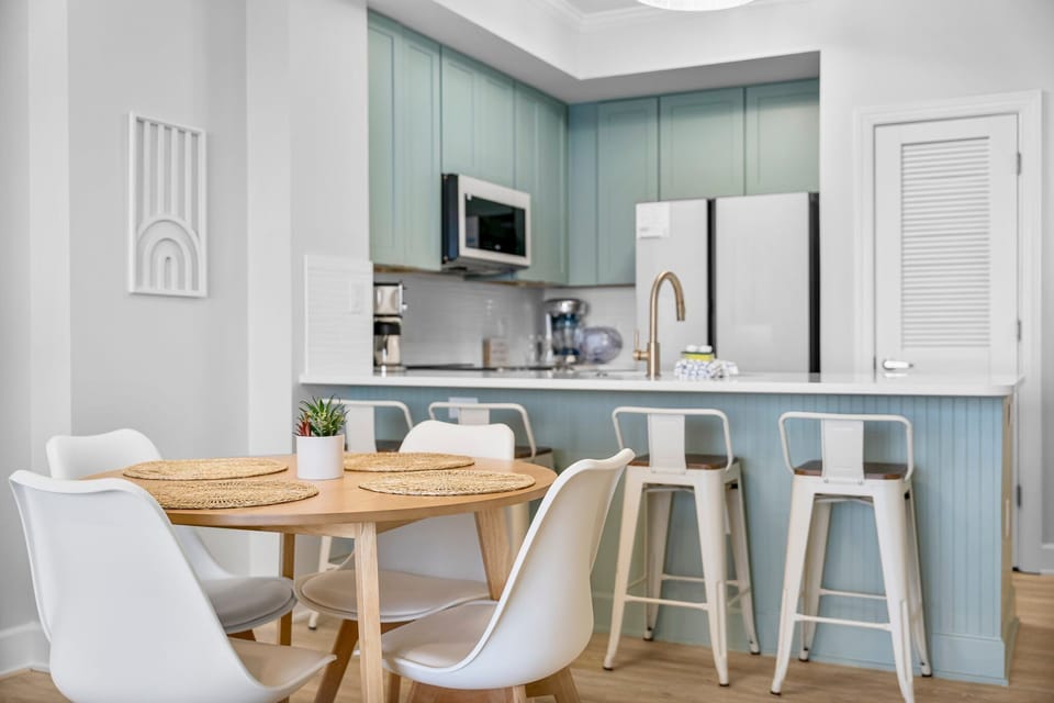 Dining area with coastal touches and light-filled space