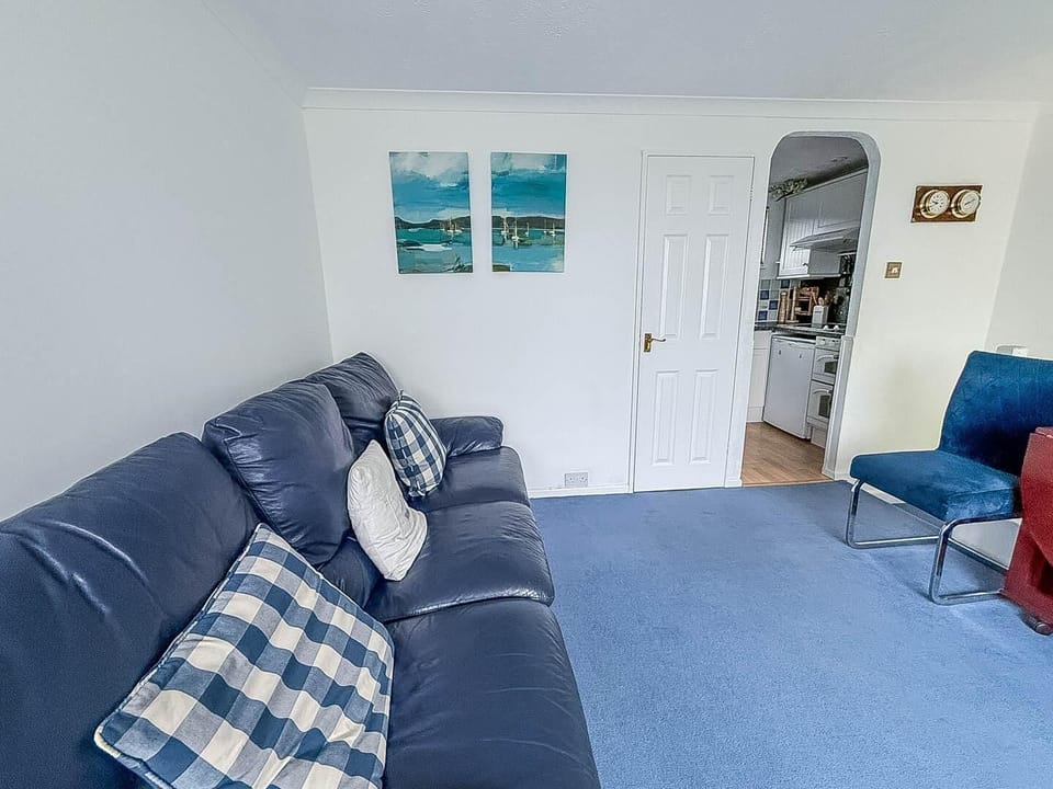Cozy living room with plush seating and calming decor