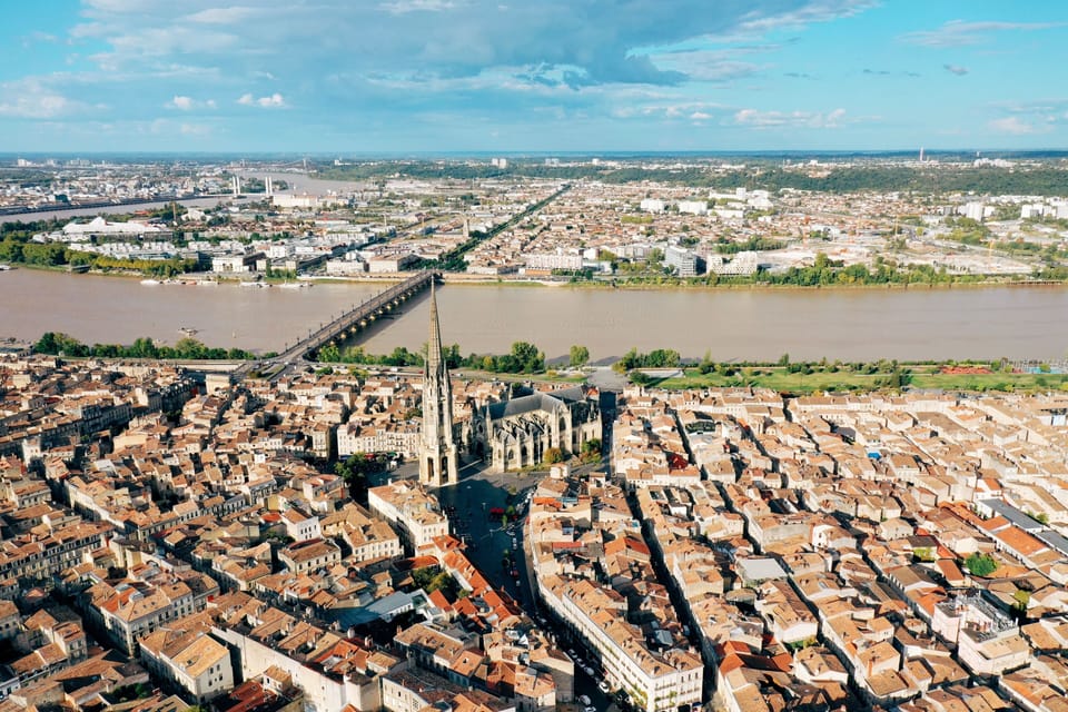 Plan a day trip to Bordeaux, renowned for its architecture, history, and world-class wine.