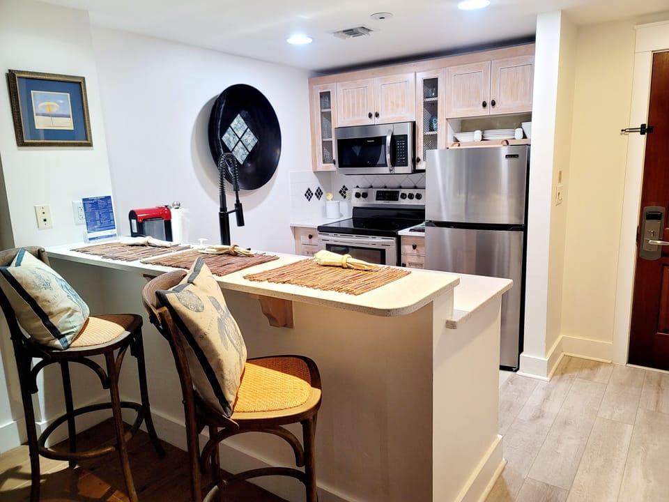 Breakfast bar with two stools