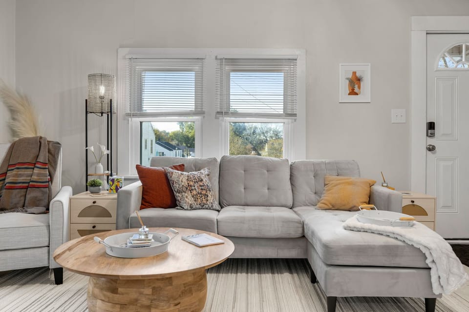 Listen to records provided on record player in cozy living room.