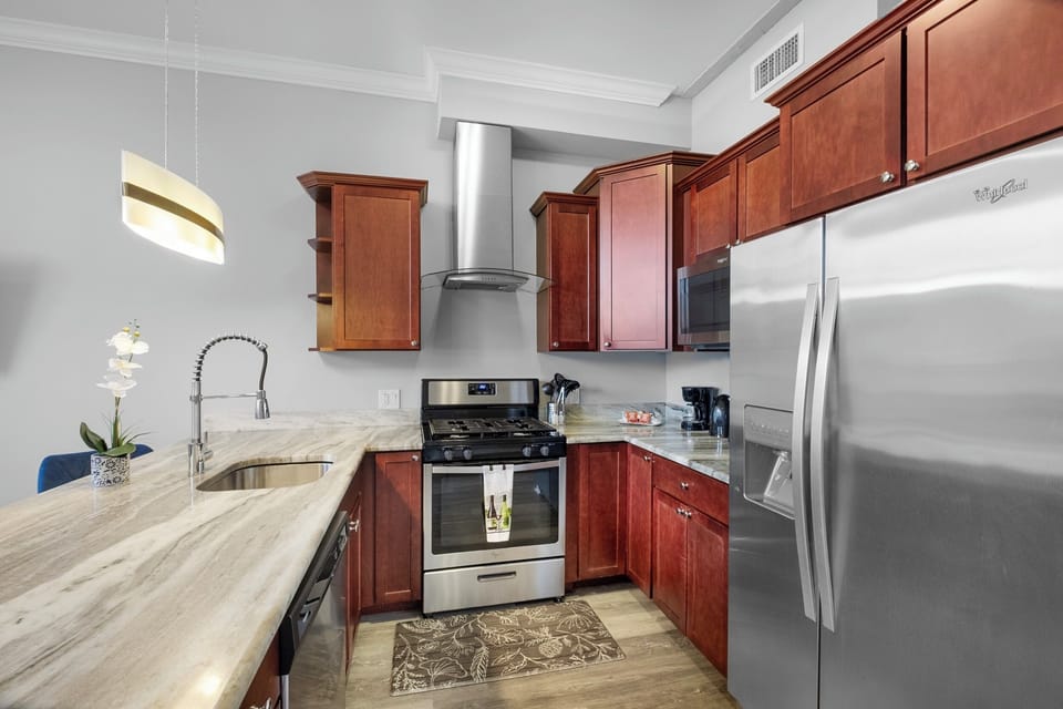 Ample cabinet space with modern fixtures.