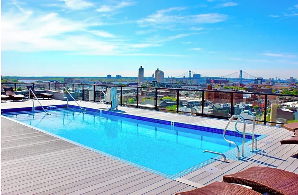 Seasonal rooftop pool with stunning Philadelphia skyline views (2 guest passes included, Memorial Day through Labor Day).