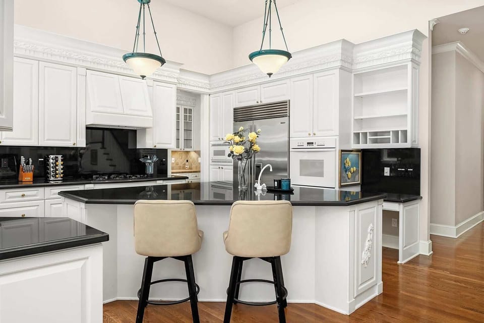 Start your day at the cozy breakfast bar, perfect for casual dining.