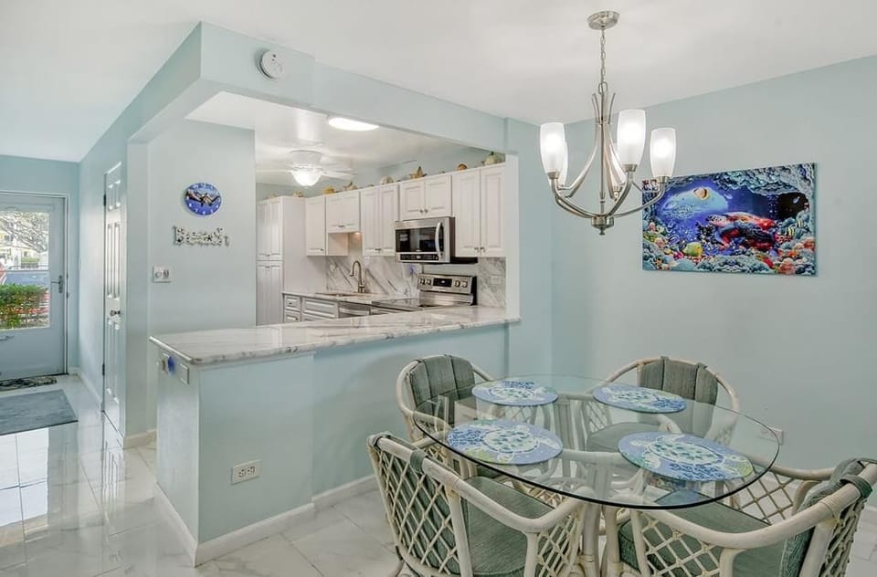 Entrance to condo and Kitchen bar