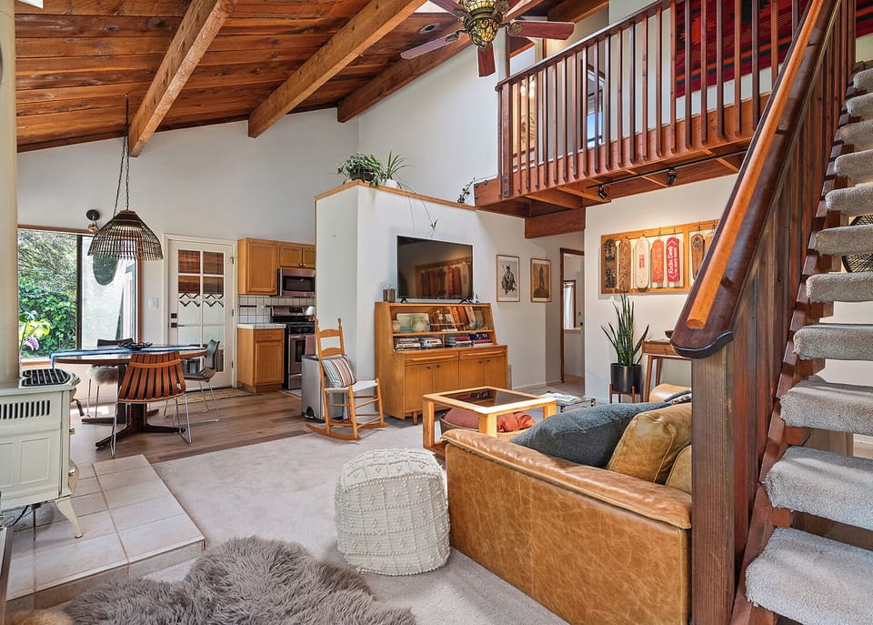 Hangout in the living room with the flatscreen TV and gas fireplace.