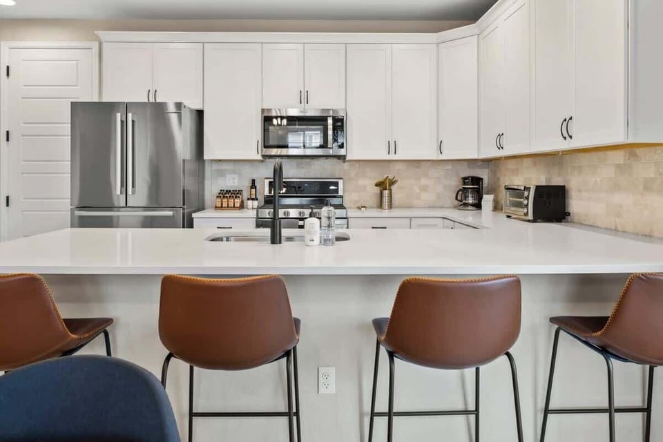 Bar-style seating at the kitchen counter