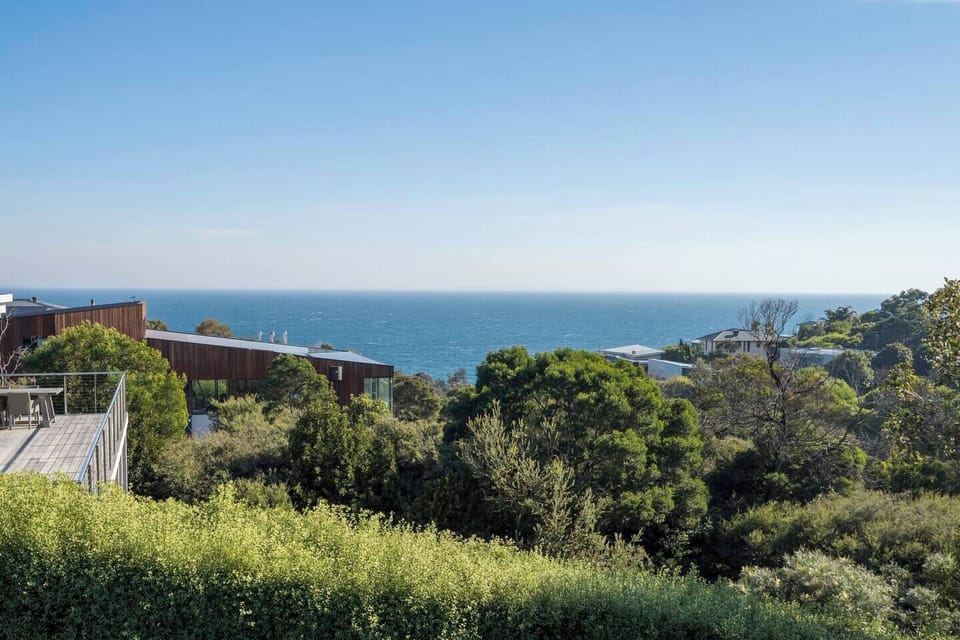 The spacious deck offers breathtaking views overlooking Port Phillip Bay. 
