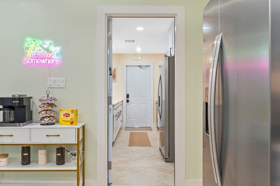 A central hotel-style door links the two Cocoa Beach units—perfect for large families, group getaways, or combined stays.