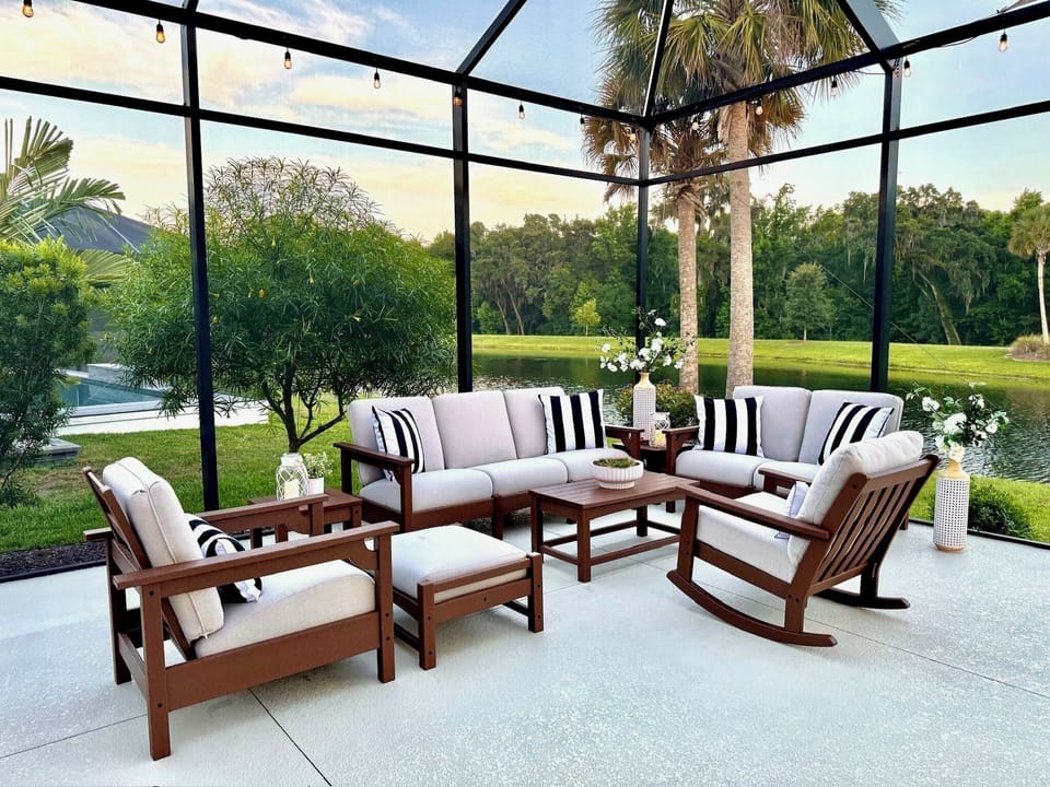 ...outdoors on the relaxing and spacious pool lanai...