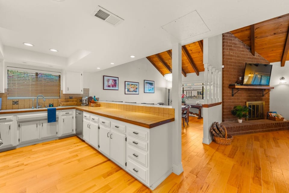Open concept kitchen, living and dining space. 