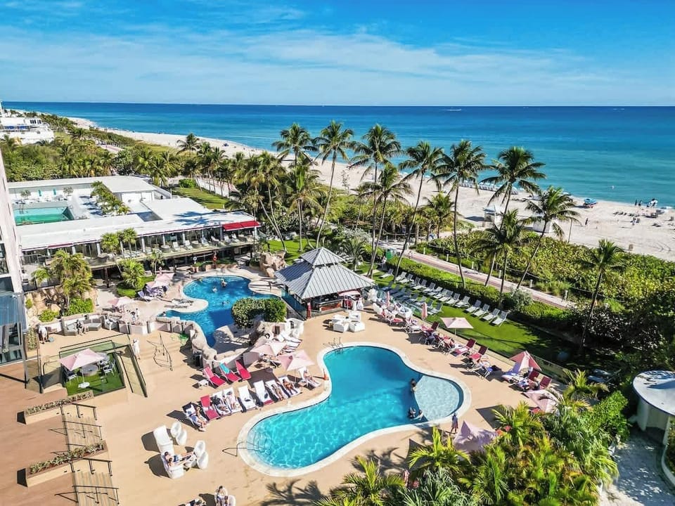 Live the resort life—private pools, sandy beach, and tropical vibes make this vacation rental unforgettable.