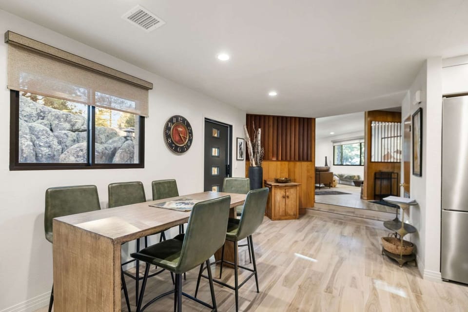 Gather around in a dining area that blends elegance and comfort, perfect for sharing meals and creating unforgettable moments.