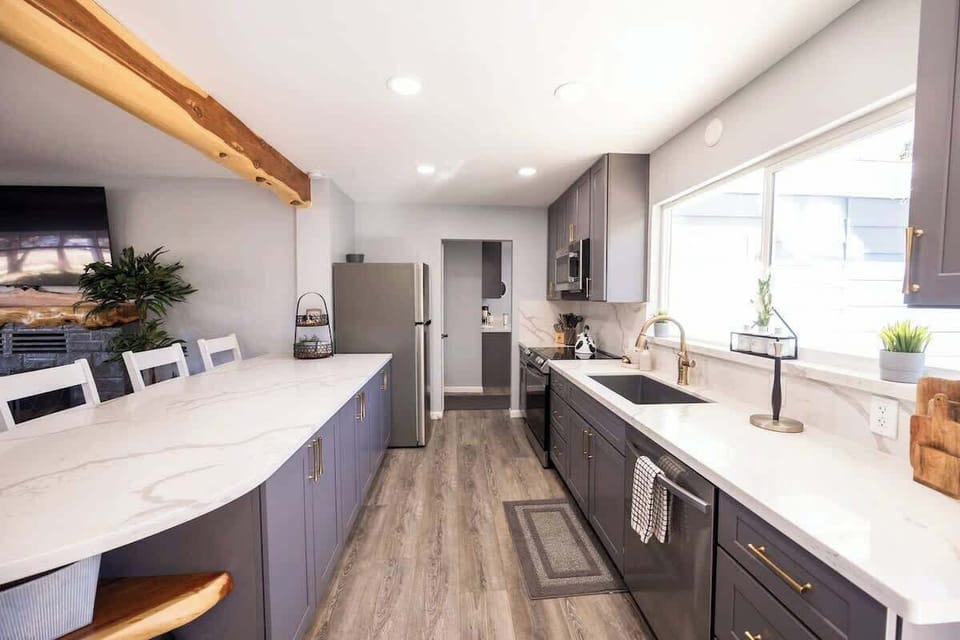 Large Kitchen with large counter space for cooking and preparing meals. 