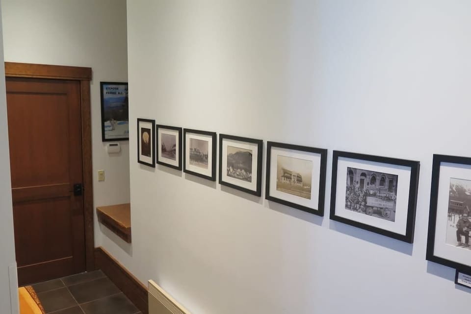 Historical photos line the hallway, adding character to the space