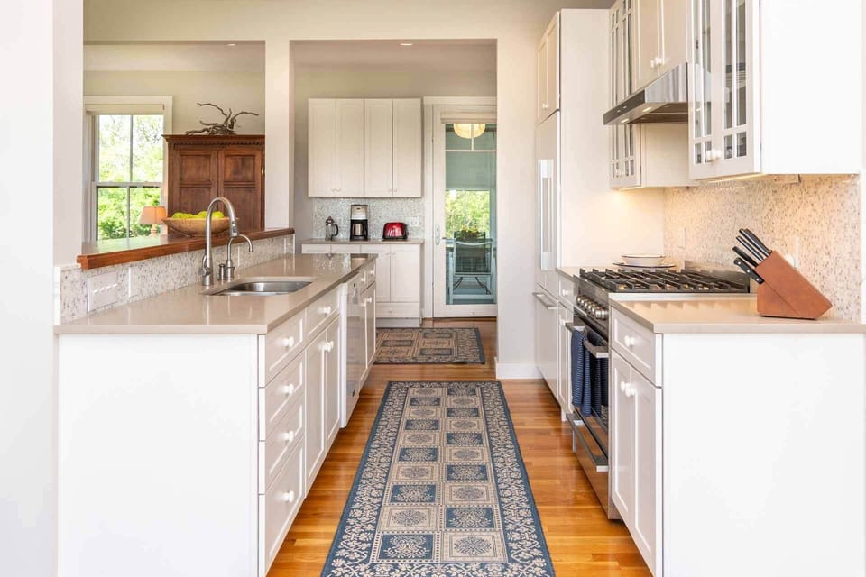 Kitchen With Screened Porch in the Distance