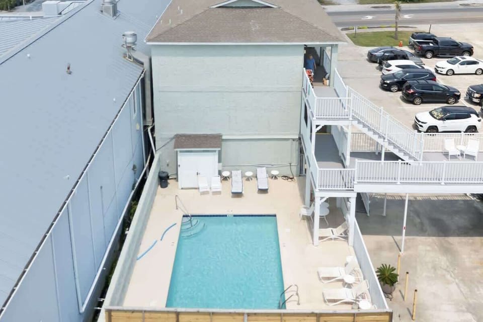 Community pool perfect for cooling off on warm beach days