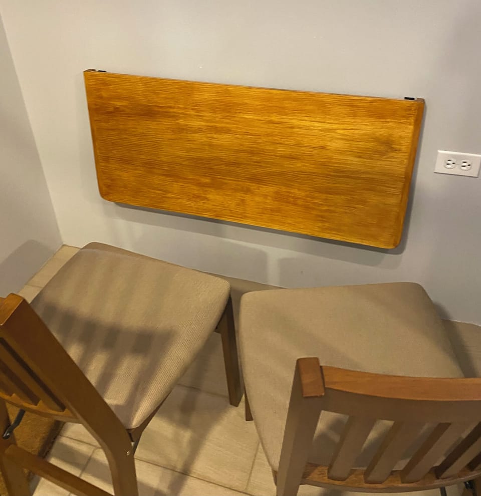Dining or working area drop down table