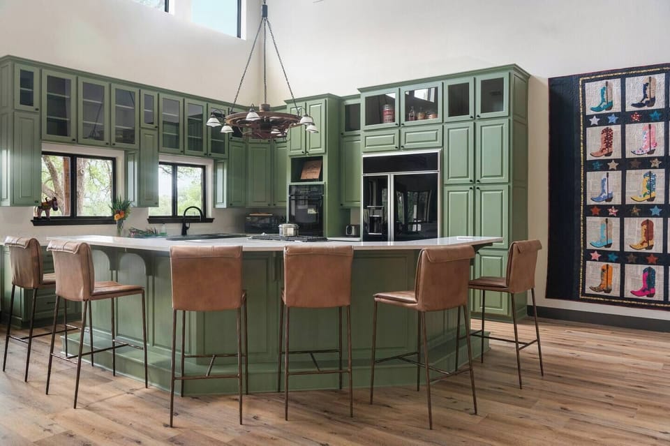In the Main House, the kitchen island bar seating makes it easy to stay connected while whipping up a fabulous meal. 