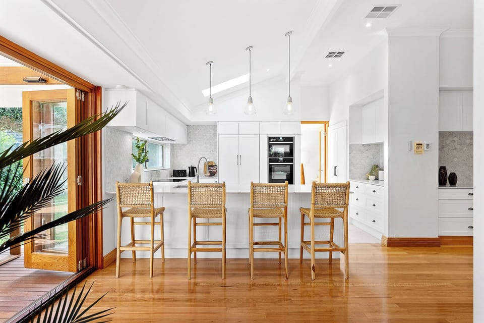 Open plan kitchen with bifold doors