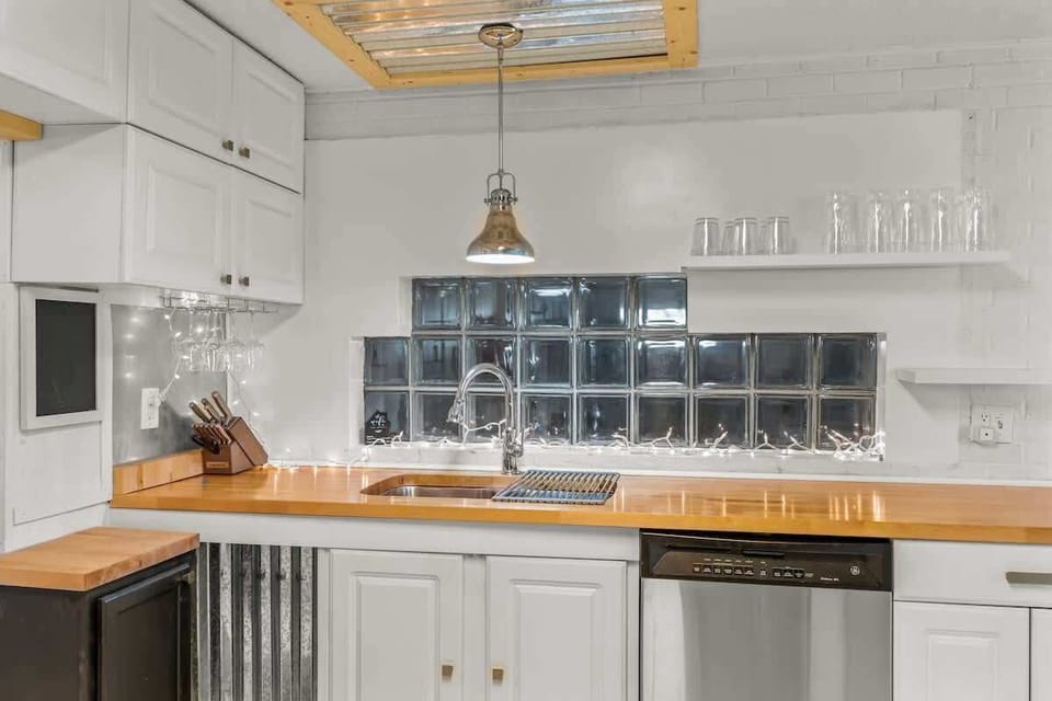 Our downstairs kitchen is fully stocked with everything you need to cook and enjoy meals with ease