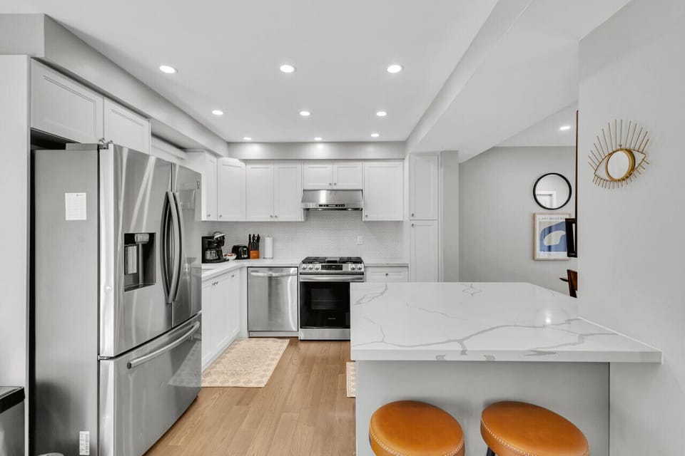 Elegant kitchen with all the essentials for cooking and dining.