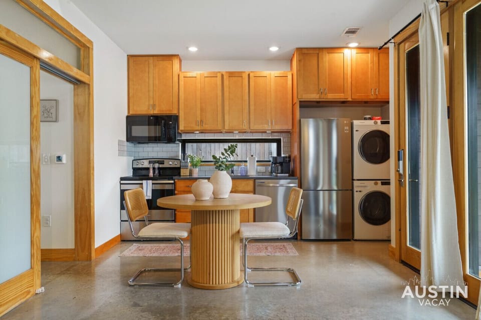 Fully equipped kitchen with all the essentials plus dishwasher, W/D, and dining