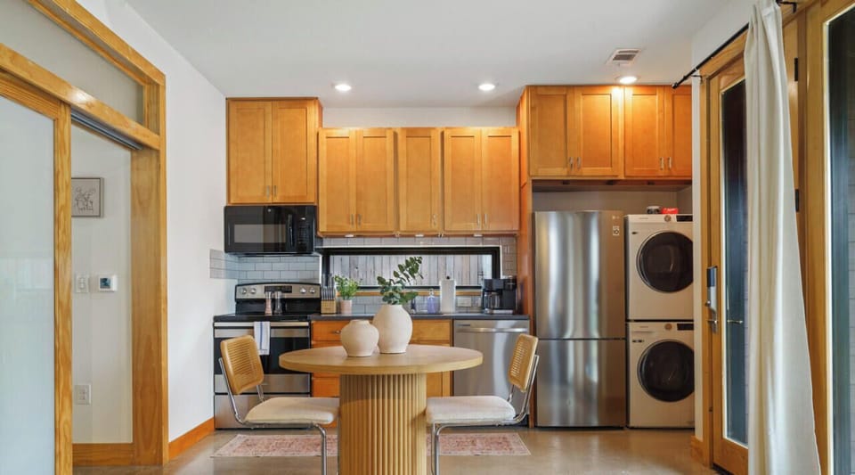 Fully equipped kitchen with all the essentials plus dishwasher, W/D, and dining