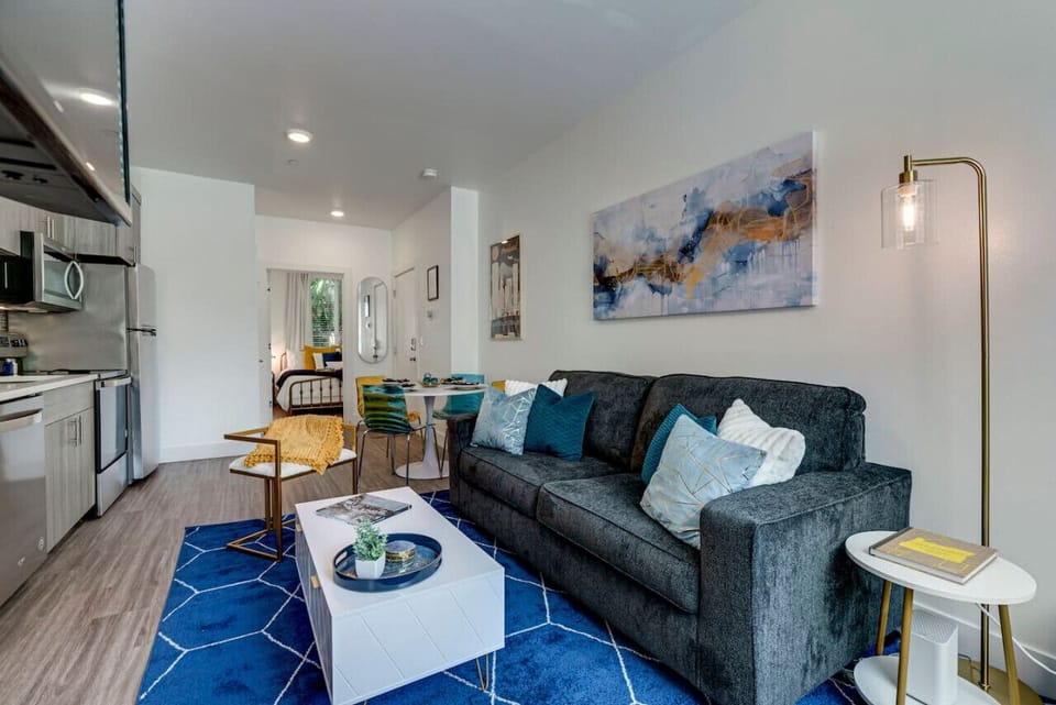 Beautiful inviting living room with a queen-size fold-out couch bed.
