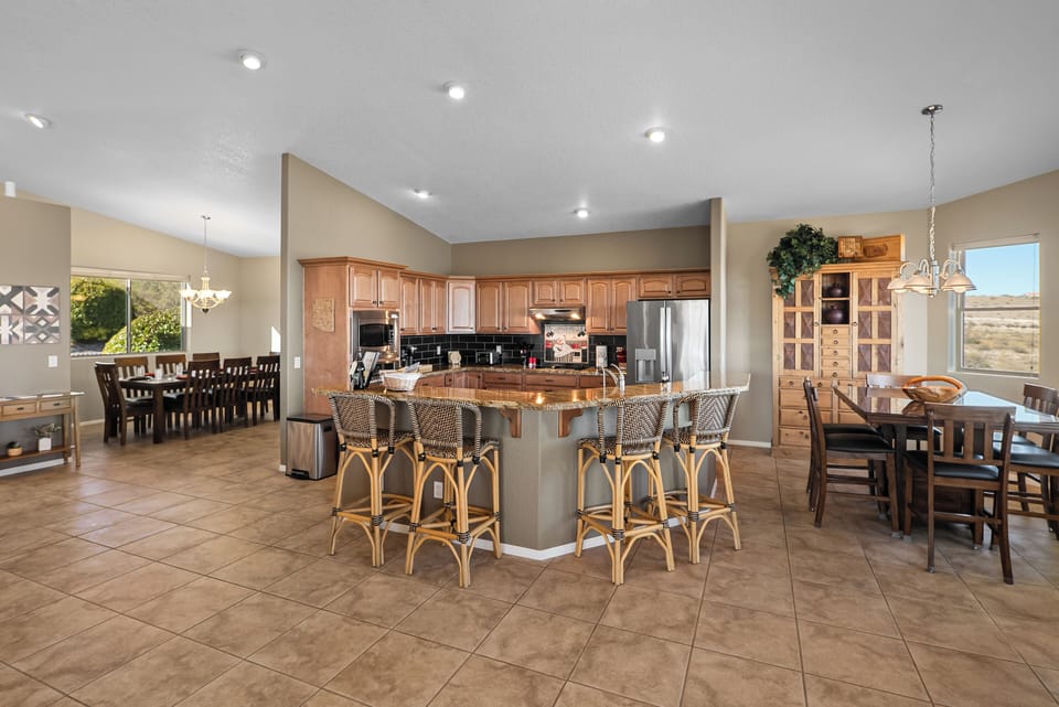 Large chef's kitchen with bar seating, dinette  and formal dining (not in pic).