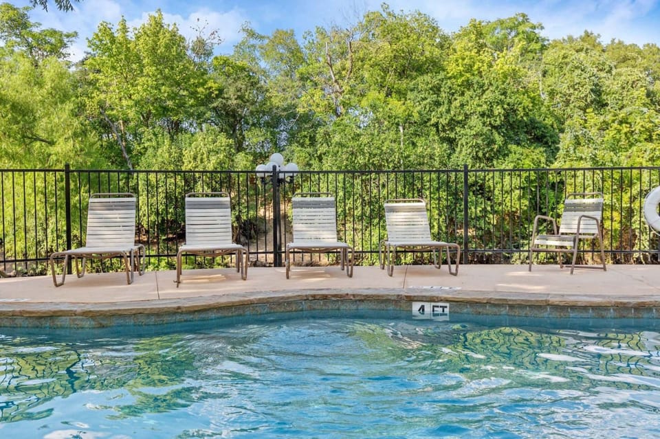 Chairs and loungers in the pool area.