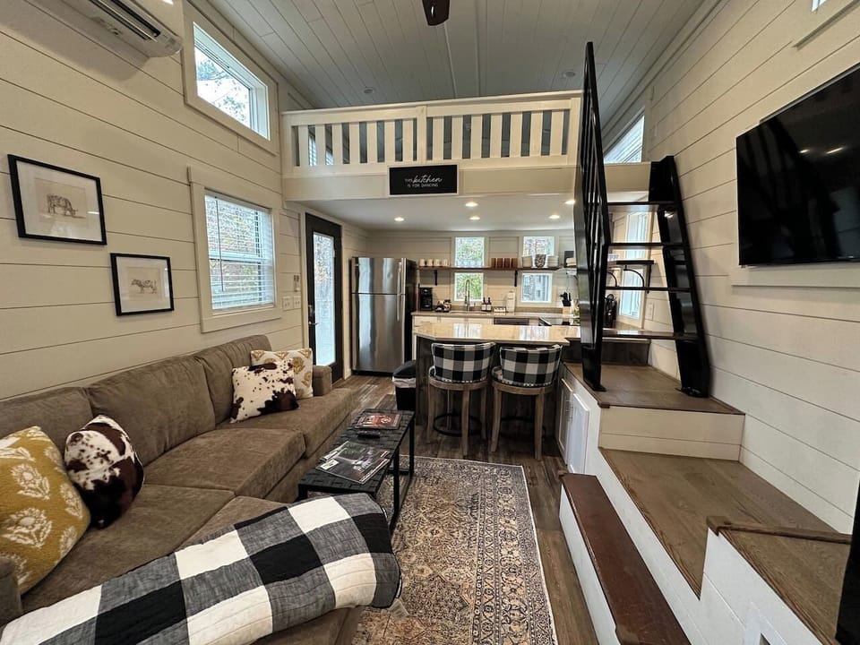 Thoughtfully designed open-concept living and kitchen area.