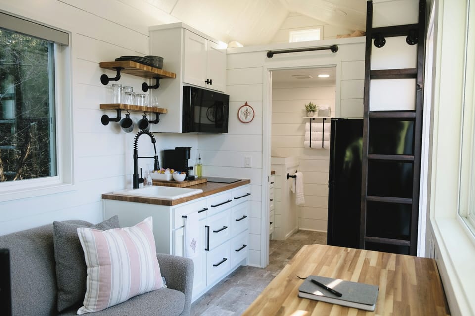 A view of the kitchen and living space.